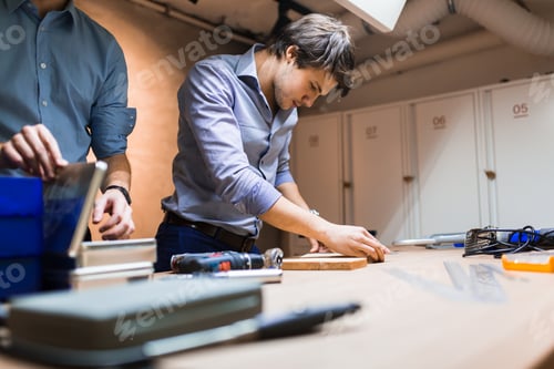Preview: Handyman working with wood
