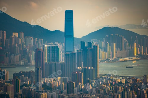 Preview: Hong Kong, China - August, 2019: bird's eye view of Hong Kong at dusk