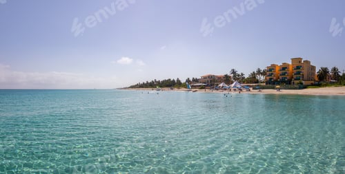 Preview: Vacation Resorts on the White sandy beach during a vibrant sunny day