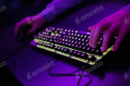 Preview: Close-up of a keyboard in neon color