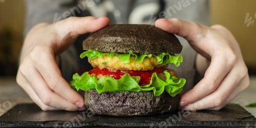 Preview: Black Burger (Bun, Meat, Tomato Sauce And Lettuce). Top Food Background. Copy Space