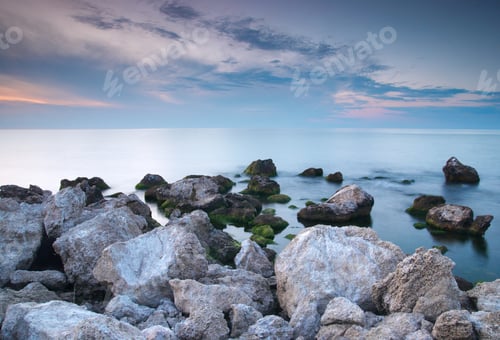 Preview: Colorful summer seascape. rocky coast at sunset