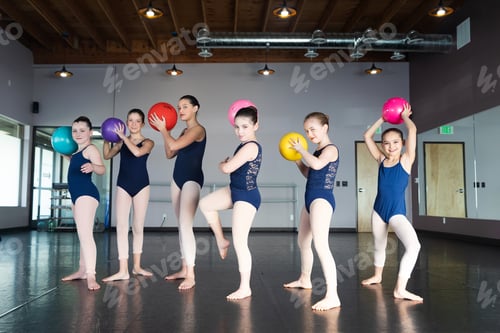 Preview: Group of six kids lined up ready to throw inflatable balls in dodgeball game