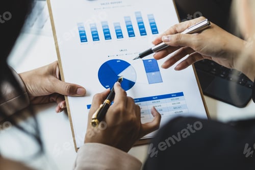 Preview: Businesswoman meeting to discuss analysis growth graph and financial charts for investment planning.