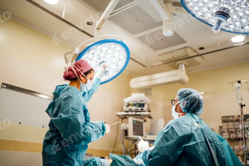 Preview: Surgeons and nurse during a foot surgery