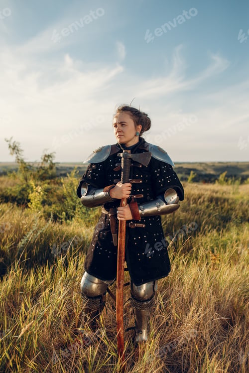 Preview: Female medieval knight poses in armor