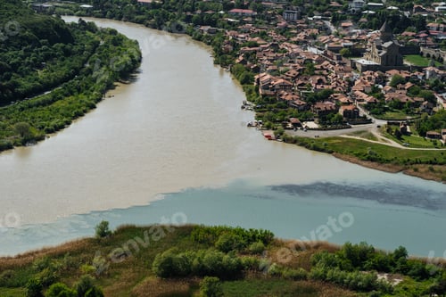 Preview: Picturesque mountainous landscape with river and town