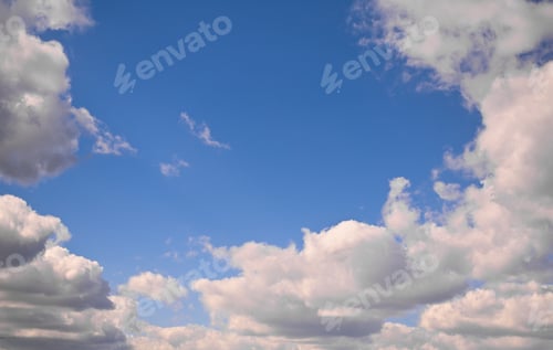 Preview: beautiful white fluffy clouds in a blue sky