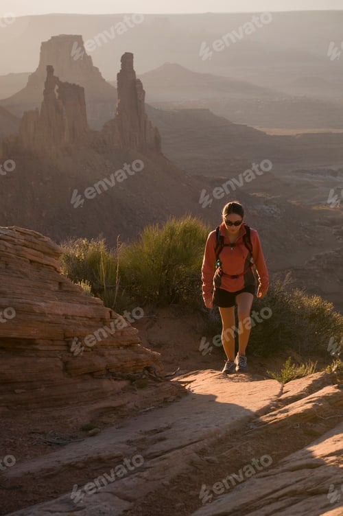 Preview: Hiker exploring rock formations