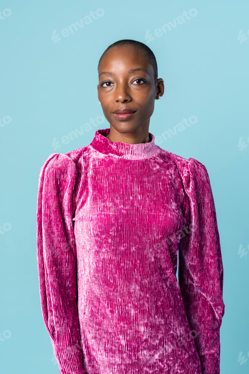 Preview: Beautiful black woman in a pink dress