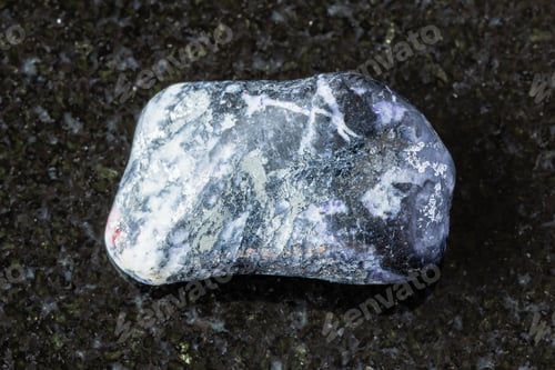 Preview: sample of polished antimonite mineral on black