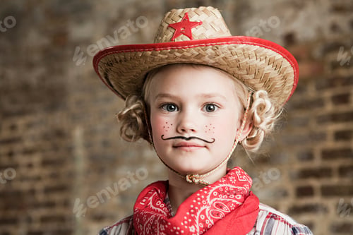 Preview: Little cowboy with an adorable mustache and straw hat