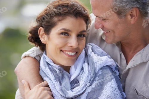 Preview: Appreciating one another. A happy mature couple with their heads together affectionately.