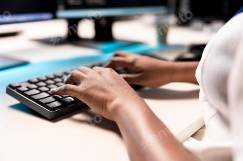 Preview: Data center employees typing on PC keyboard, creating technical documentation