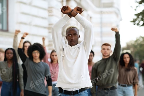Preview: Black guy activist leading international group of young people
