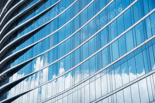 Preview: Pattern of blue glasses in high building with shadow of cloud. Abstract modern building background.