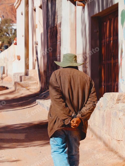Preview: Old man walking in Purmamarca, Jujuy, Argentina.