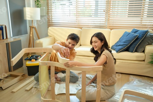 Preview: Photo series of young asian couple assembly a new furniture at home