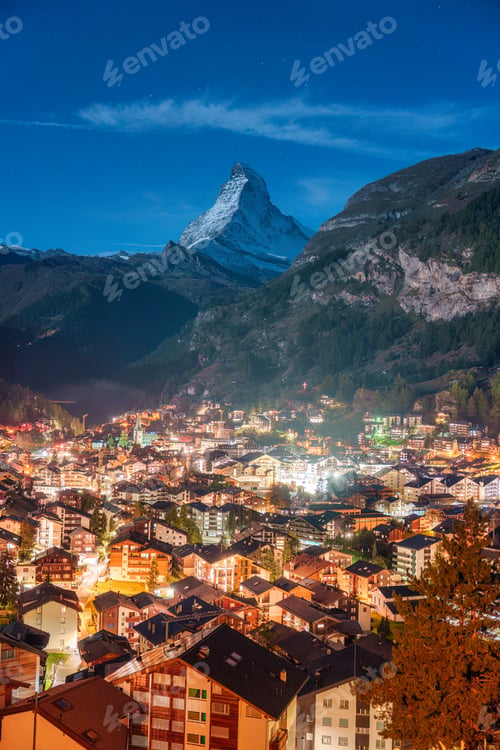 Preview: Viewpoint of illuminated Zermatt village and Matterhorn mountain in the night at Switzerland
