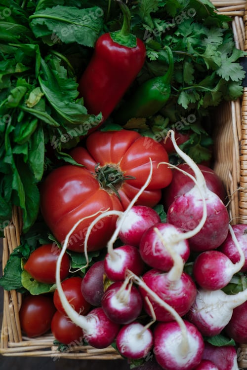 Preview: basket with vegetables and potherbs