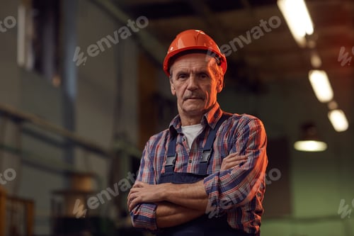Preview: Worker in work helmet in the plant