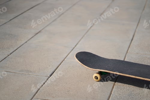 Preview: a skateboard on concrete floor