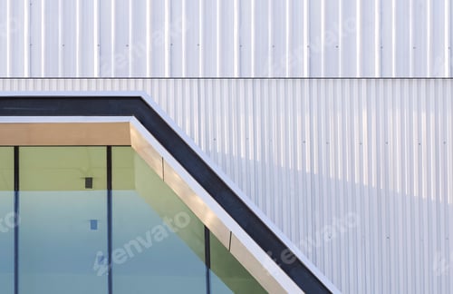 Preview: Awning with glass wall on white corrugated steel wall of modern industrial office building