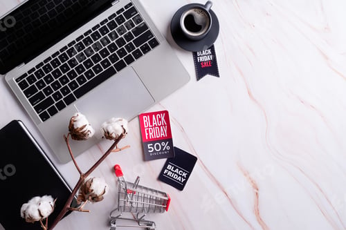 Preview: Black Friday Sale words on the tag, workspace with laptop, tablet and smartphone top view flat lay