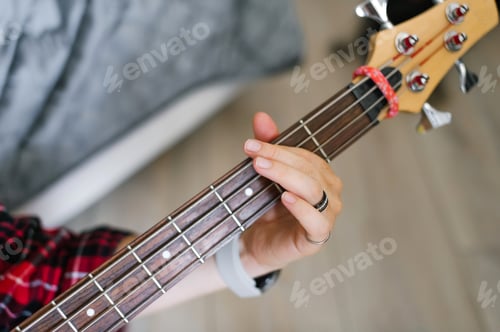 Preview: Guitar Beginner Practicing Chords at Home