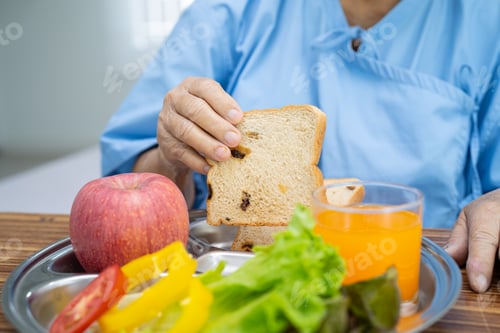 Preview: Asian senior or elderly old lady woman patient eating breakfast vegetable healthy food