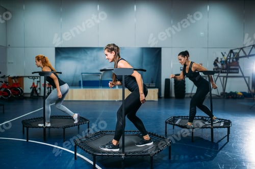 Preview: Women group on sport trampoline, fitness workout