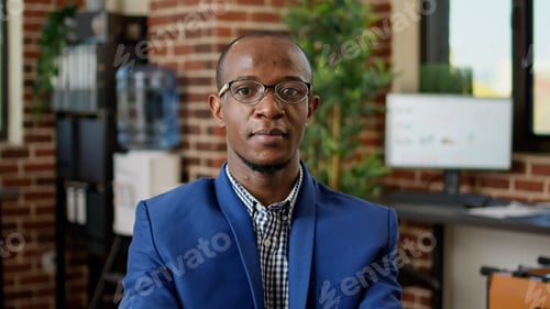 Preview: Portrait of african american employee answering email on laptop