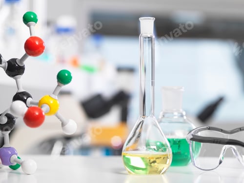 Preview: Laboratory glassware and molecular structure sitting on a lab bench during a experiment