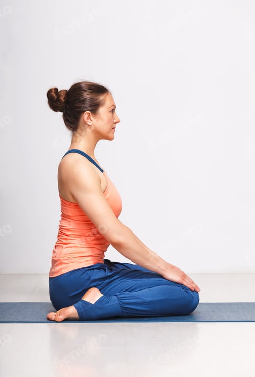 Preview: Woman in Hatha yoga asana Vajrasana