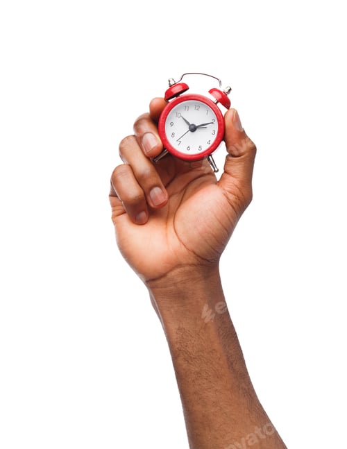 Preview: Black male hand holding red alarm clock