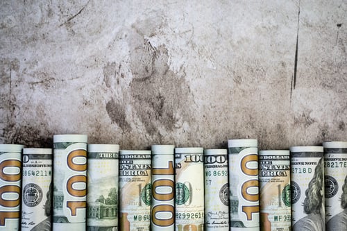 Preview: US dollar bills in rolls