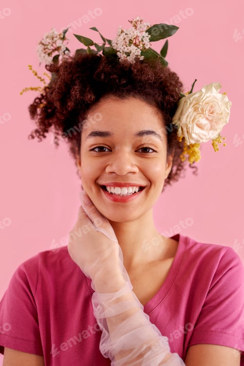 Preview: Close up of happy young smiling female african ethnicity in pink clothes, transparent gloves