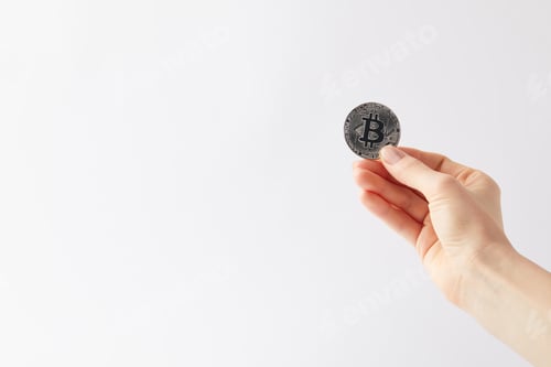 Preview: cropped shot of woman holding bitcoin isolated on white