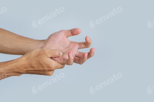 Preview: Young man suffering with problem trigger finger.Office syndrome Concept.Health concept.