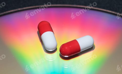 Preview: Closeup of the white and red medicine capsules on a rainbow background