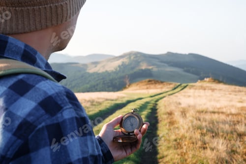 Preview: Man with compass in hand