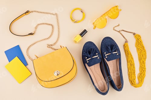 Preview: Flat lay with woman fashion accessories in yellow and blue colors. Fashion blog, summer style