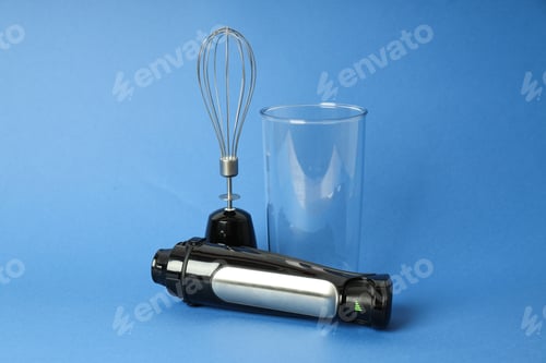Preview: Kitchen utensils, electric hand mixer close-up.
