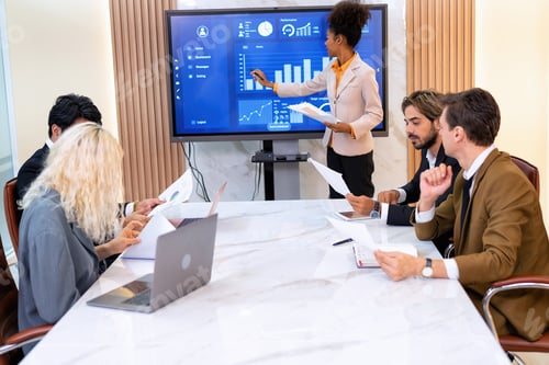 Preview: Employee on job corporate Business colleagues around the table look presentation from large screen