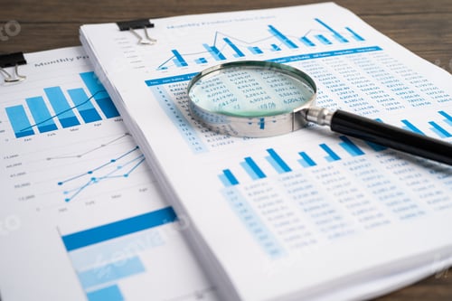 Preview: Magnifying glass on charts graphs paper. Financial development, Banking Account, Statistics,
