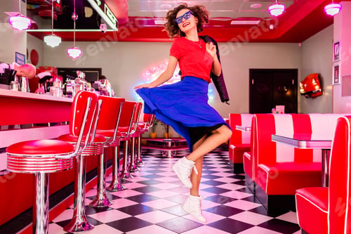 Preview: stylish smiling woman in retro vintage cafe