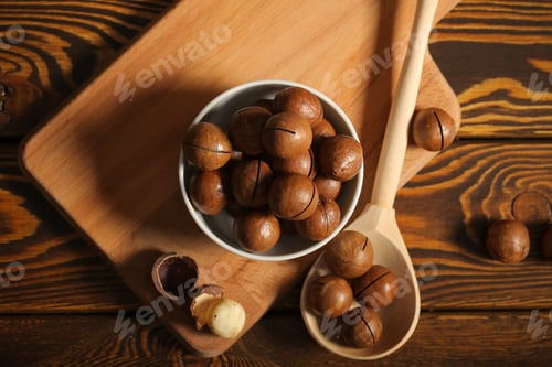 Preview: Macadamia Nuts Lie On A Black Background