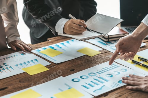 Preview: A desk in a company conference room has a group of business people attending.