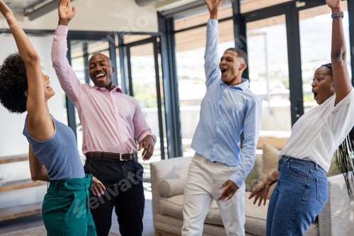 Preview: Colleagues celebrating success together in modern office, raising hands joyfully