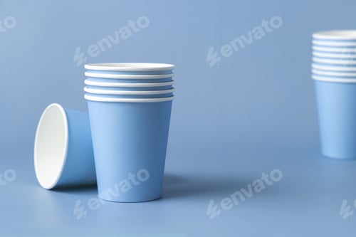 Preview: Disposable light blue paper cups closeup, mockup, copy space. No plastic biodegradable single-use